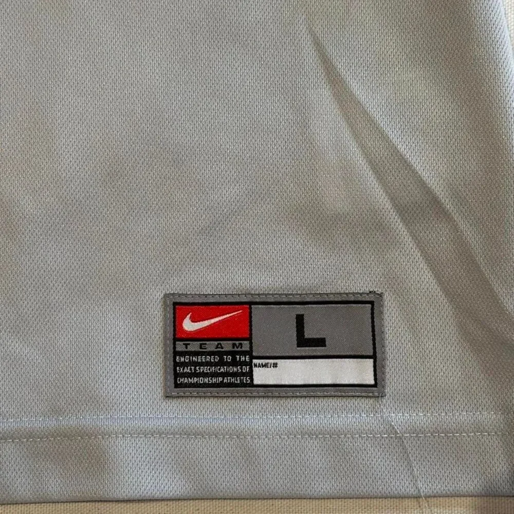 Nike Women's Grey and White T-shirt